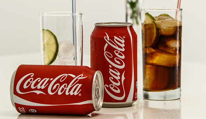 Ποιος πραγματικά ανακάλυψε Coca Cola;